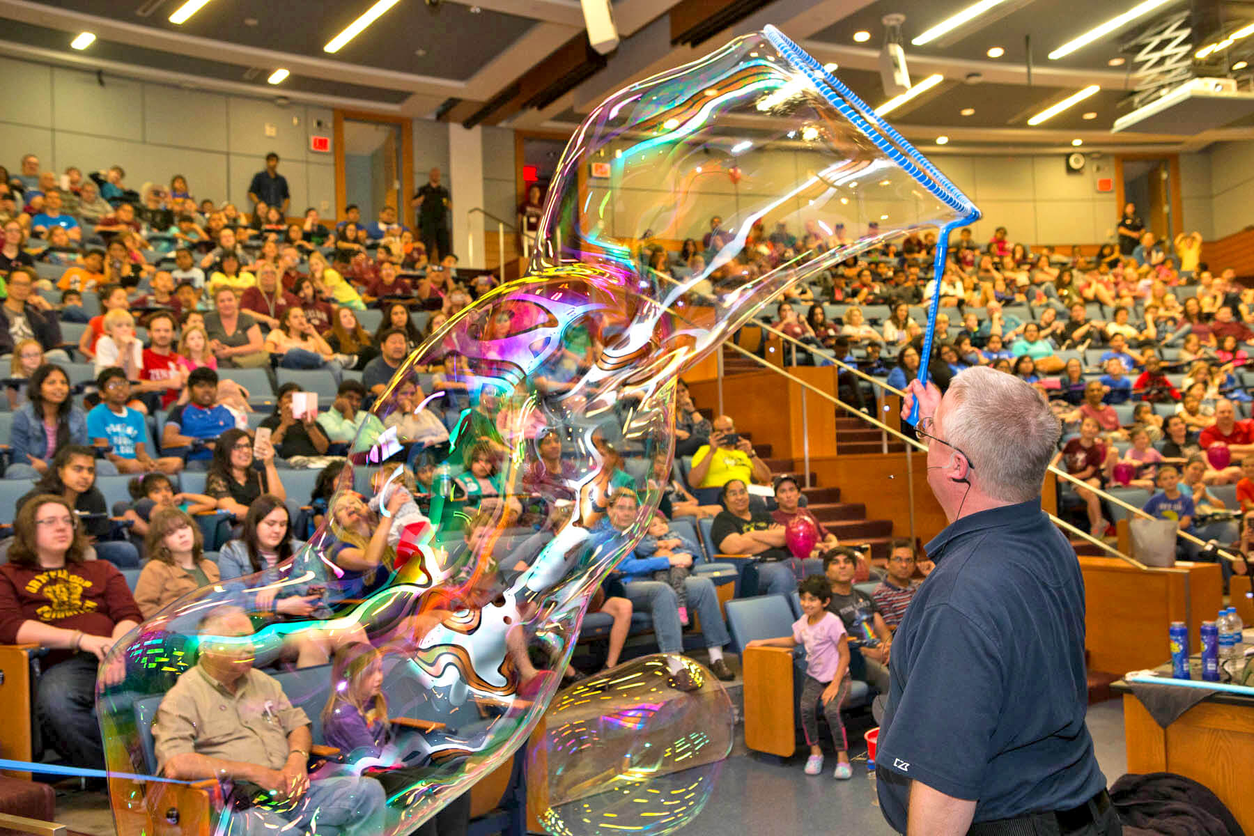 Watch the marvelous motion of soap bubbles large and small in a container with dry ice.
